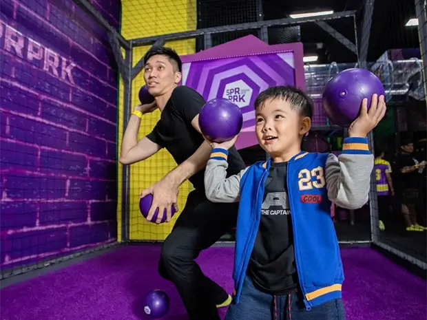 Kid and parent enjoy SuperBall at SuperPark Highpoint