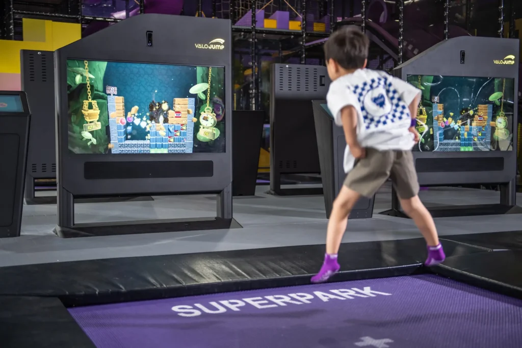 Kids play on purple trampolines at indoor playground Melbourne