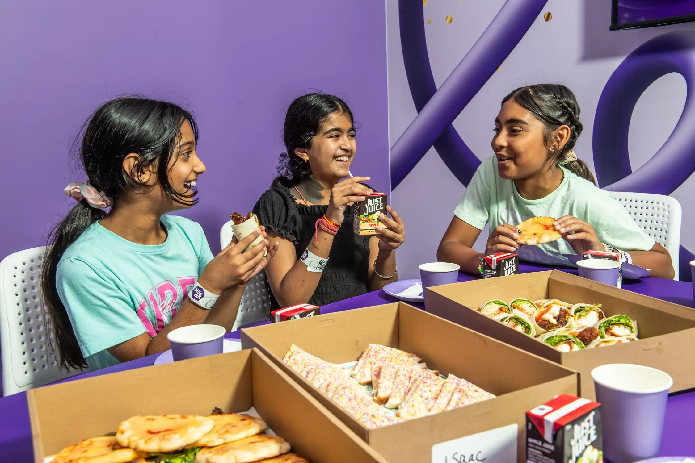 Three girls enjoy a kids’ birthday party at SuperPark